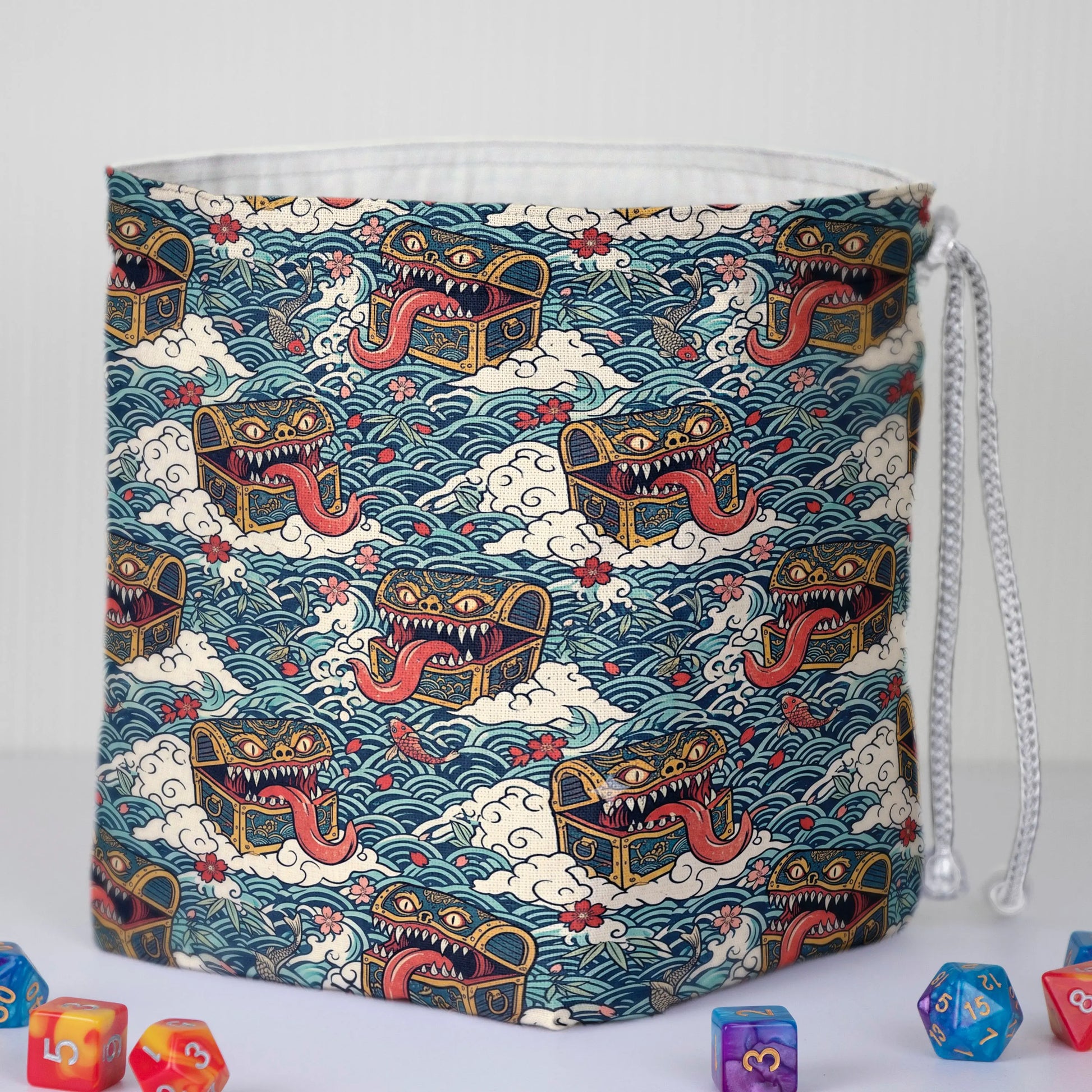Japanese art mimic dice bag — fits 6 dice sets in pockets plus loose dice in the middle