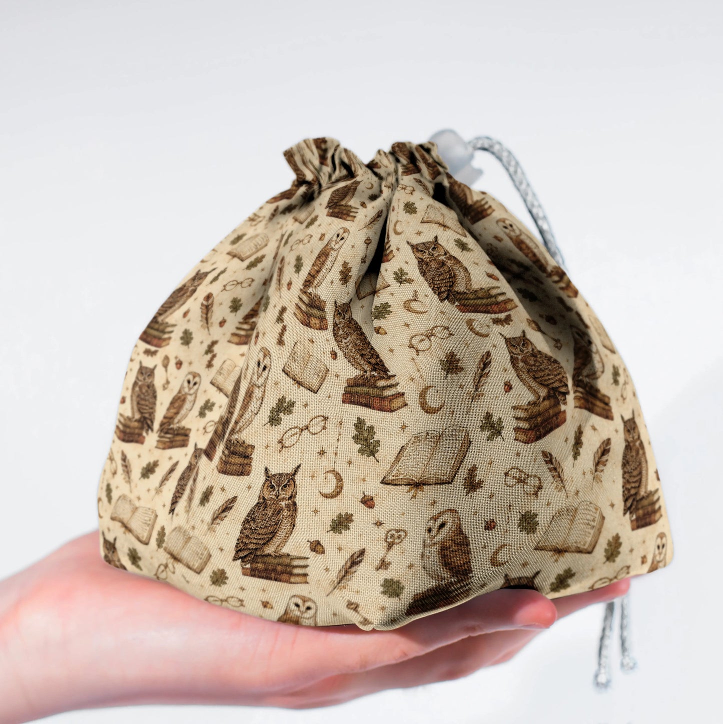 The Owl Atheneum dice bag standing upright on its square base for table-side access.