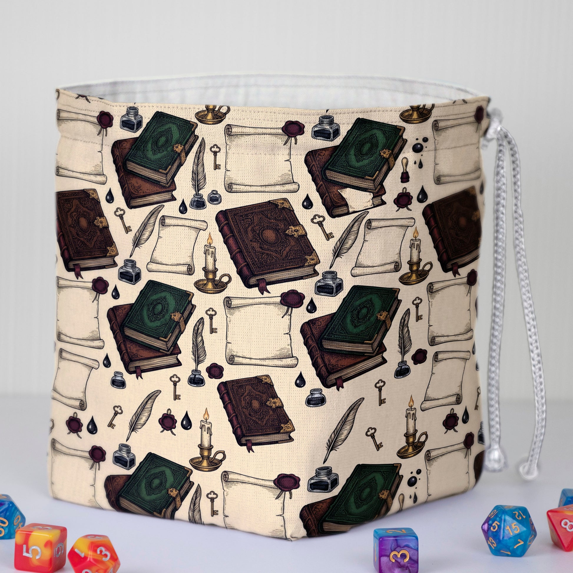 Antique spellbook print dice bag with 6 pockets — sorts dice sets for a Dungeon Master.