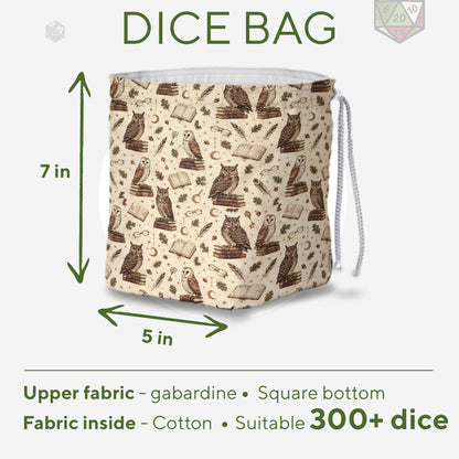 Detail of owls and spectacles on the Owl Atheneum dice bag — handmade ivory gabardine.