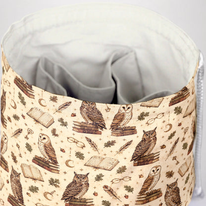 The Owl Atheneum dice bag front view with drawstring closure — scholarly dark academia DnD pouch.