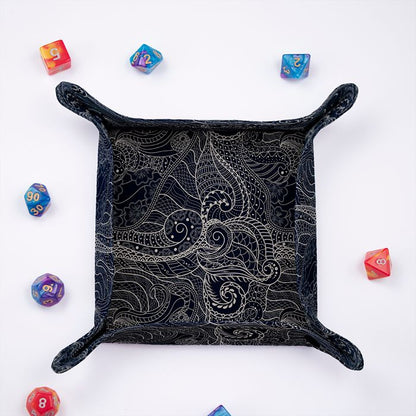 Dragon Scale dice tray from above, ornate dragon skin pattern in silver on deep navy