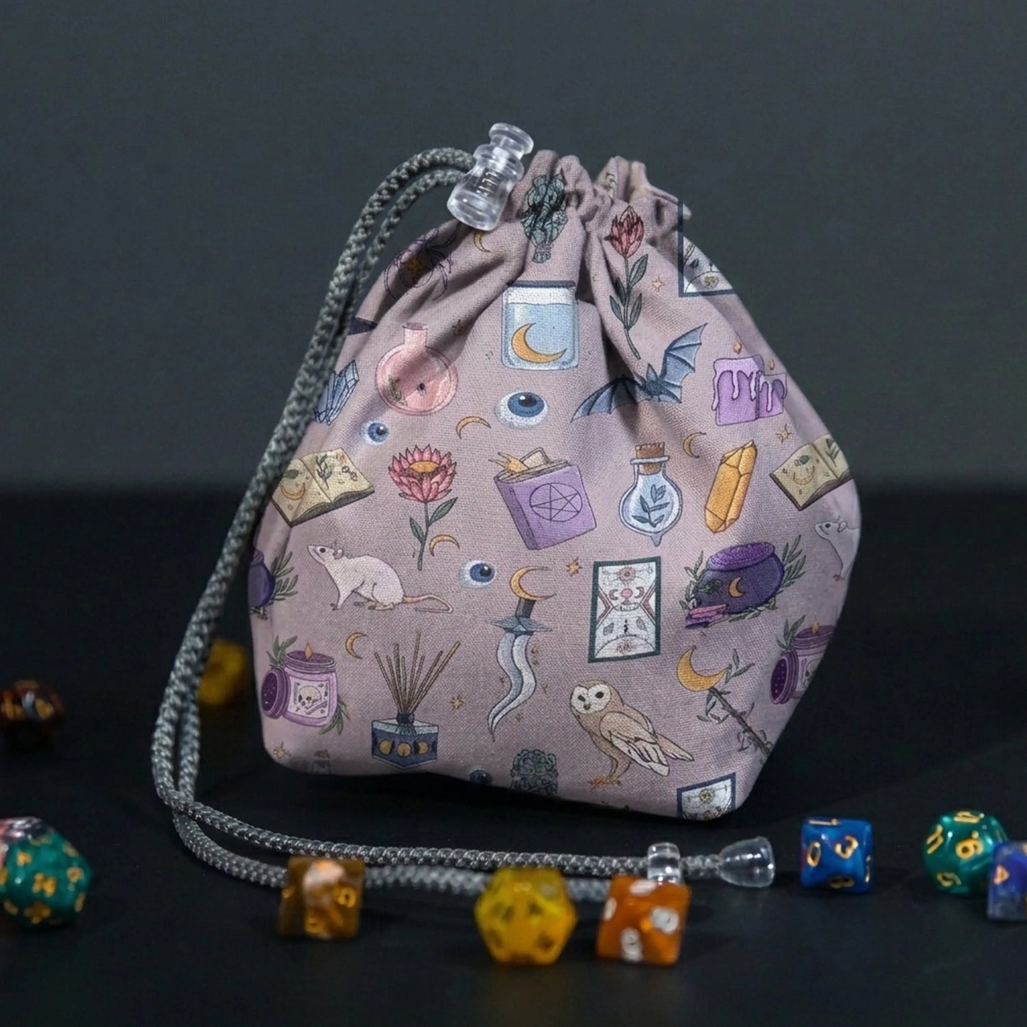 Purple witch dice bag with 6 pockets — sorts dice sets for a witchy table.