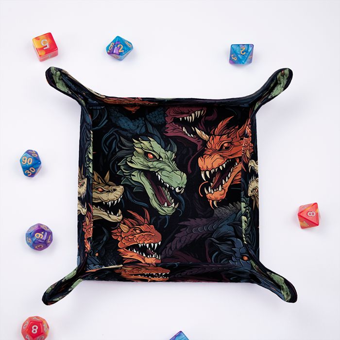 Chromatic Dragon dice tray from above, snarling dragon heads print on the rolling surface