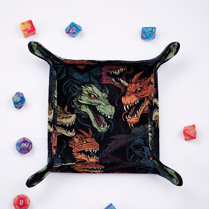 Chromatic Dragon dice tray from above, snarling dragon heads print on the rolling surface