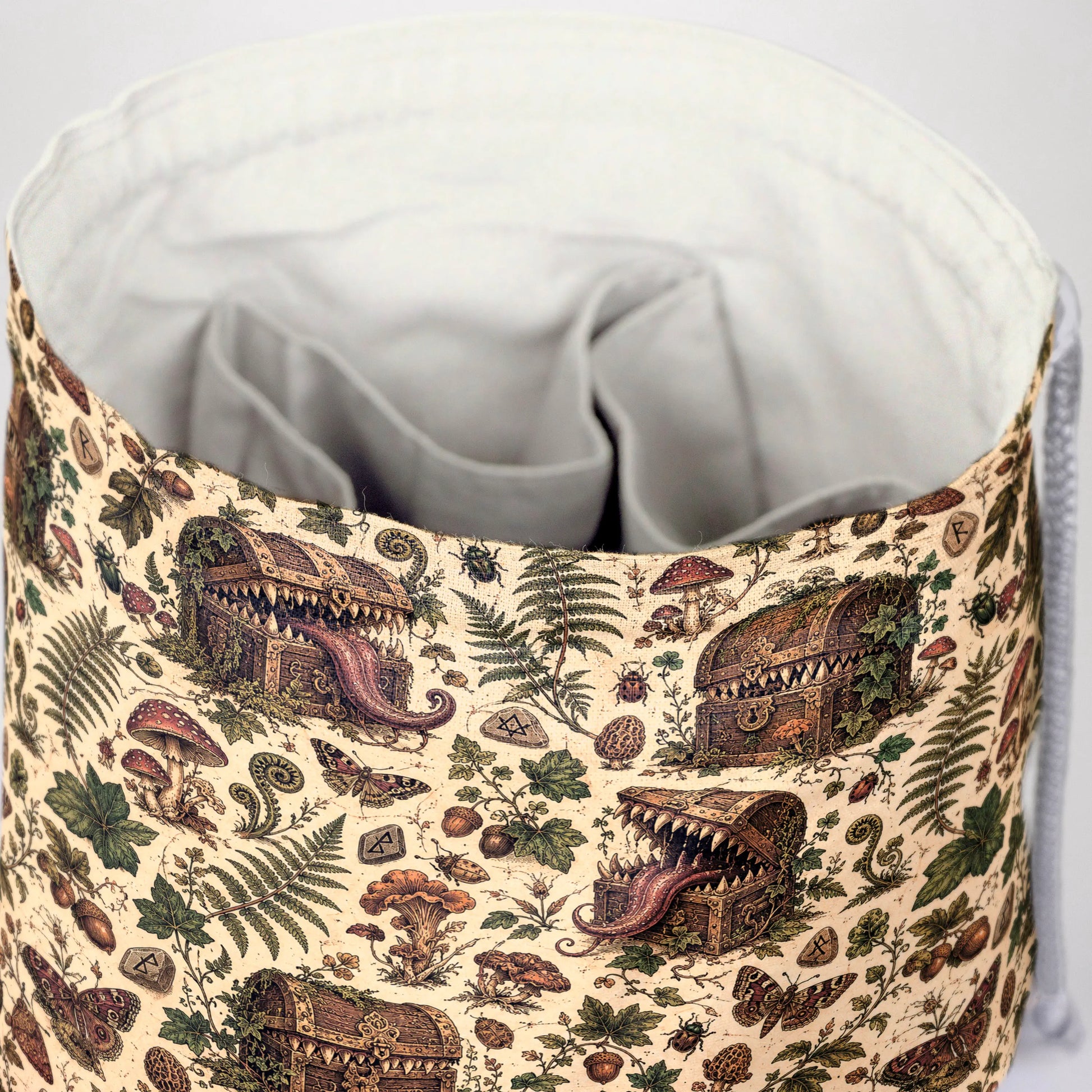 Cottagecore mimic dice bag — fits 6 dice sets in pockets plus loose dice in the middle
