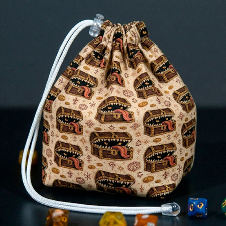 Treasure mimic dice bag — classic wooden chests with teeth and gold coins on parchment, holds 300+ dice