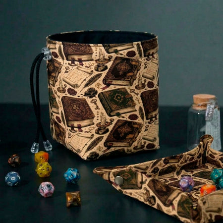 Ancient spellbooks dice bag and tray set — matching grimoire-print bag and fold-flat tray for DnD.