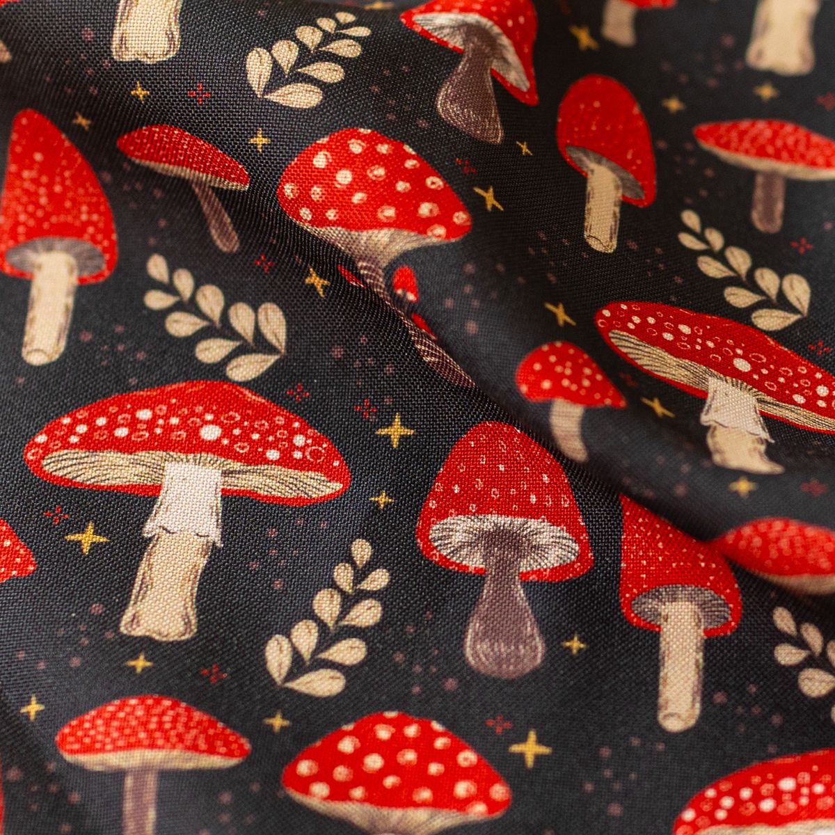 Close-up of GameFancy mushroom print fabric, forest design, used for handmade dice bag and tray sets