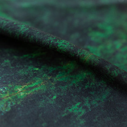 Close-up of GameFancy deep green forest print fabric, mossy texture, used for handmade dice bags and trays