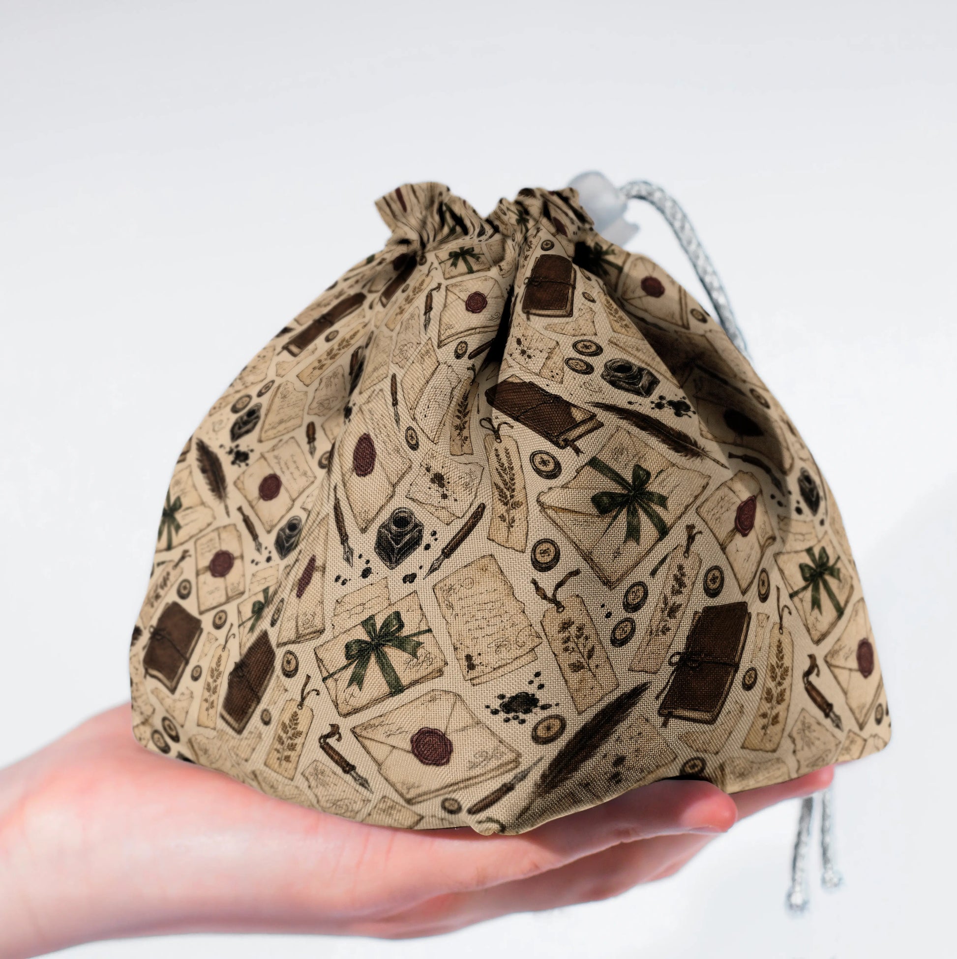 The Letter Writer dice bag standing upright on its square base for table-side access.