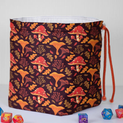 Autumn Mushroom dice bag standing upright on its square base for table-side access.