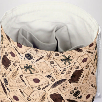 The Letter Writer dice bag front view with drawstring closure — dark academia DnD pouch.
