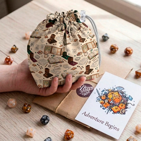 A gift for a dungeon master — behind-the-screen dice bag with rulebooks, notes and coffee on cream, holds 300+ dice.