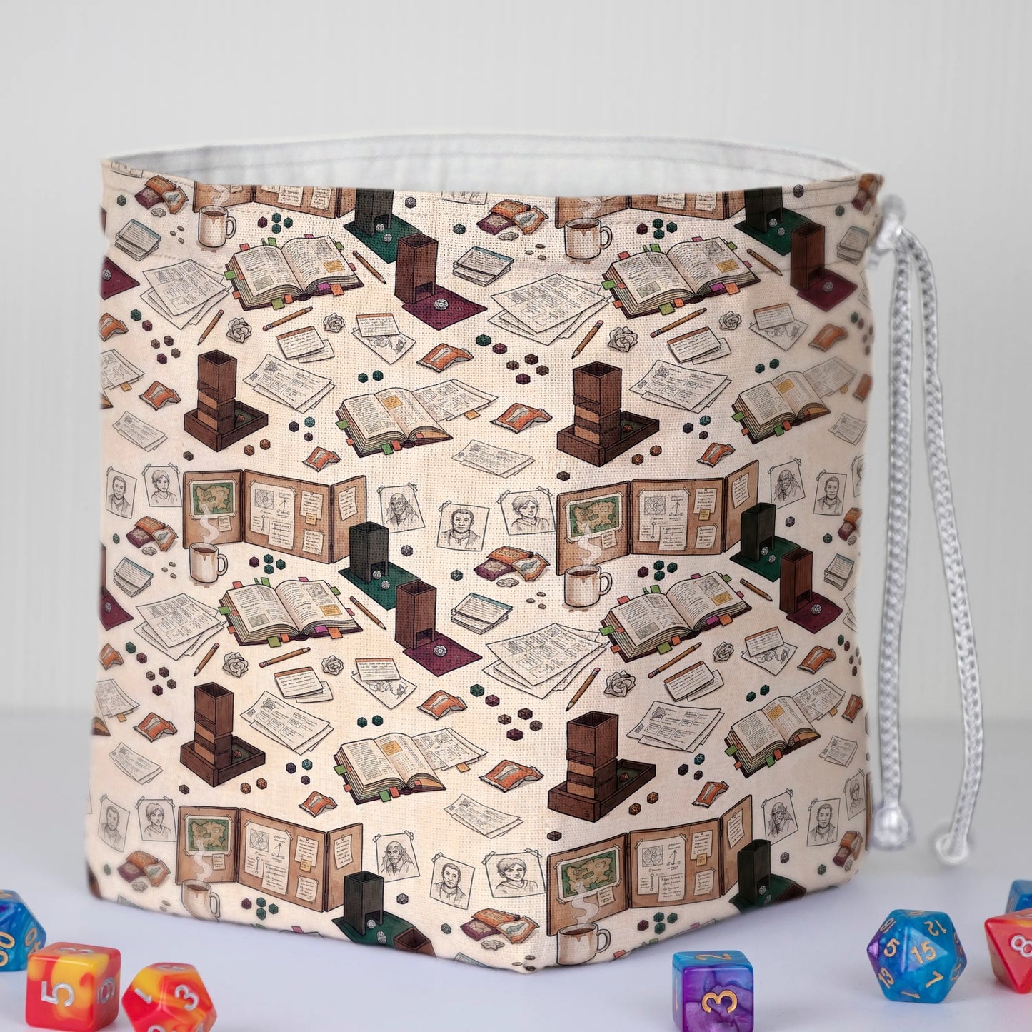 Dungeon Master's Desk dice bag held in hand — handmade DnD organizer with pockets.