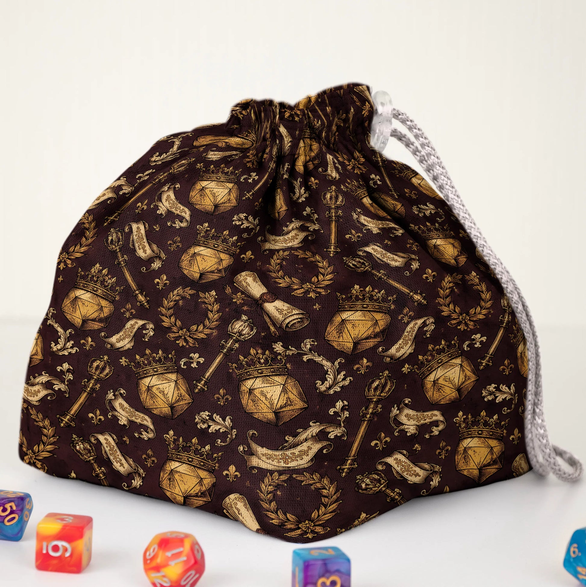 Brown Dungeon Master crest dice bag held in hand — handmade gabardine DnD organizer.