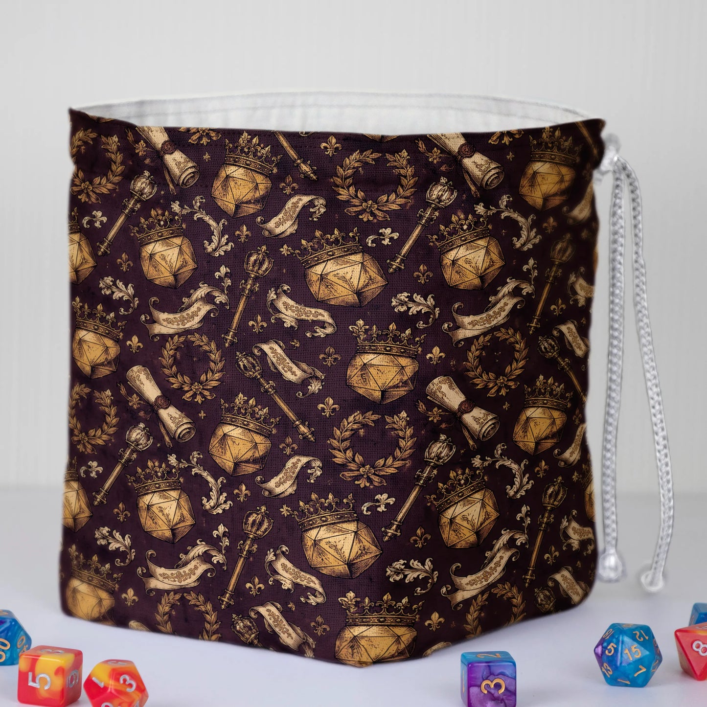 Crest dice bag with 6 pockets — sorts dice sets for a DM who has tons of dice sets.