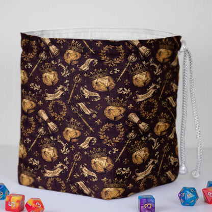Crest dice bag with 6 pockets — sorts dice sets for a DM who has tons of dice sets.