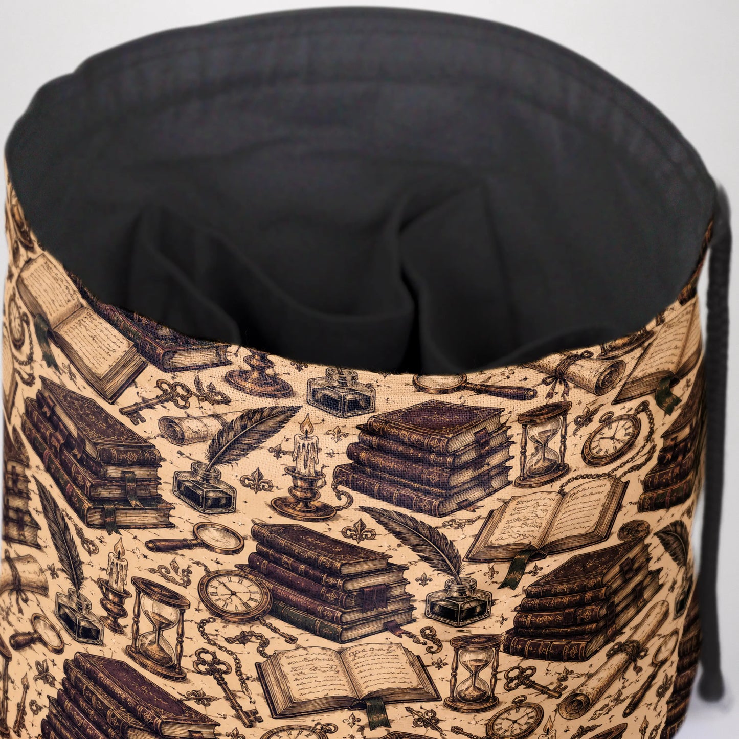 The Scriptorium dice bag front view with drawstring closure — scholarly dark academia DnD pouch.
