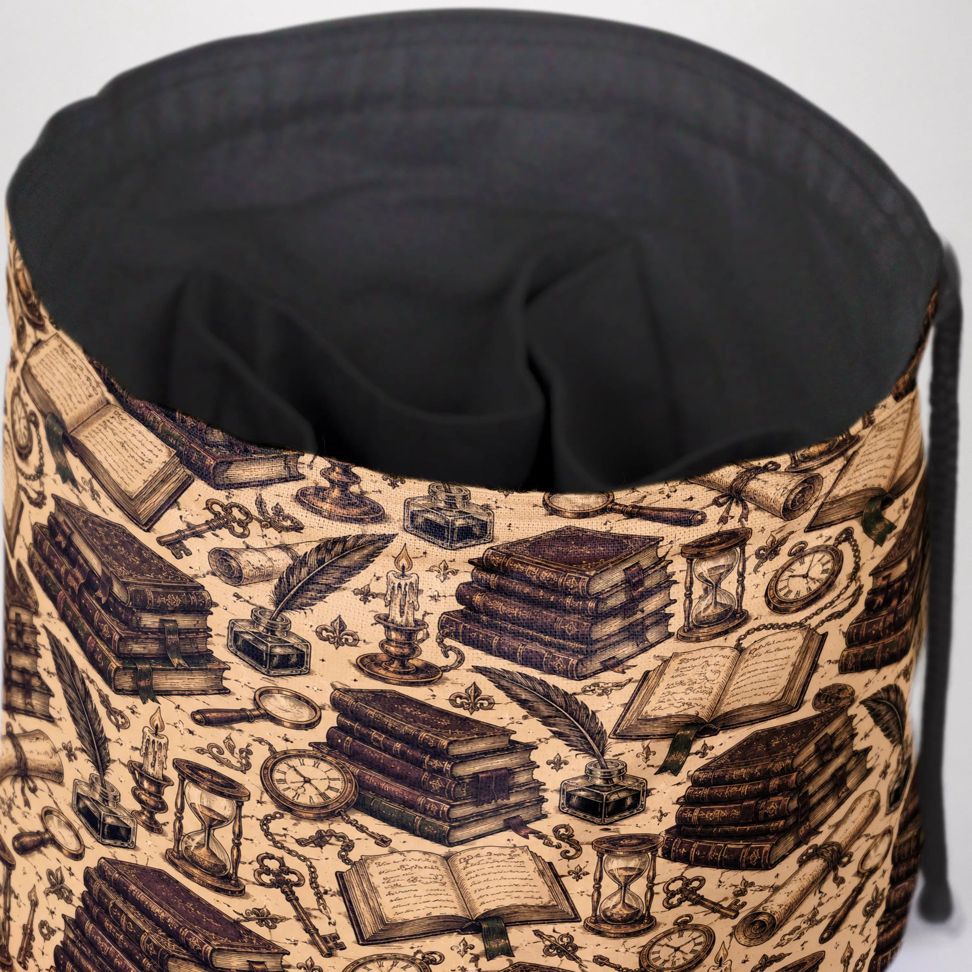 The Scriptorium dice bag front view with drawstring closure — scholarly dark academia DnD pouch.