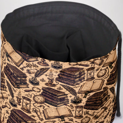 The Scriptorium dice bag front view with drawstring closure — scholarly dark academia DnD pouch.