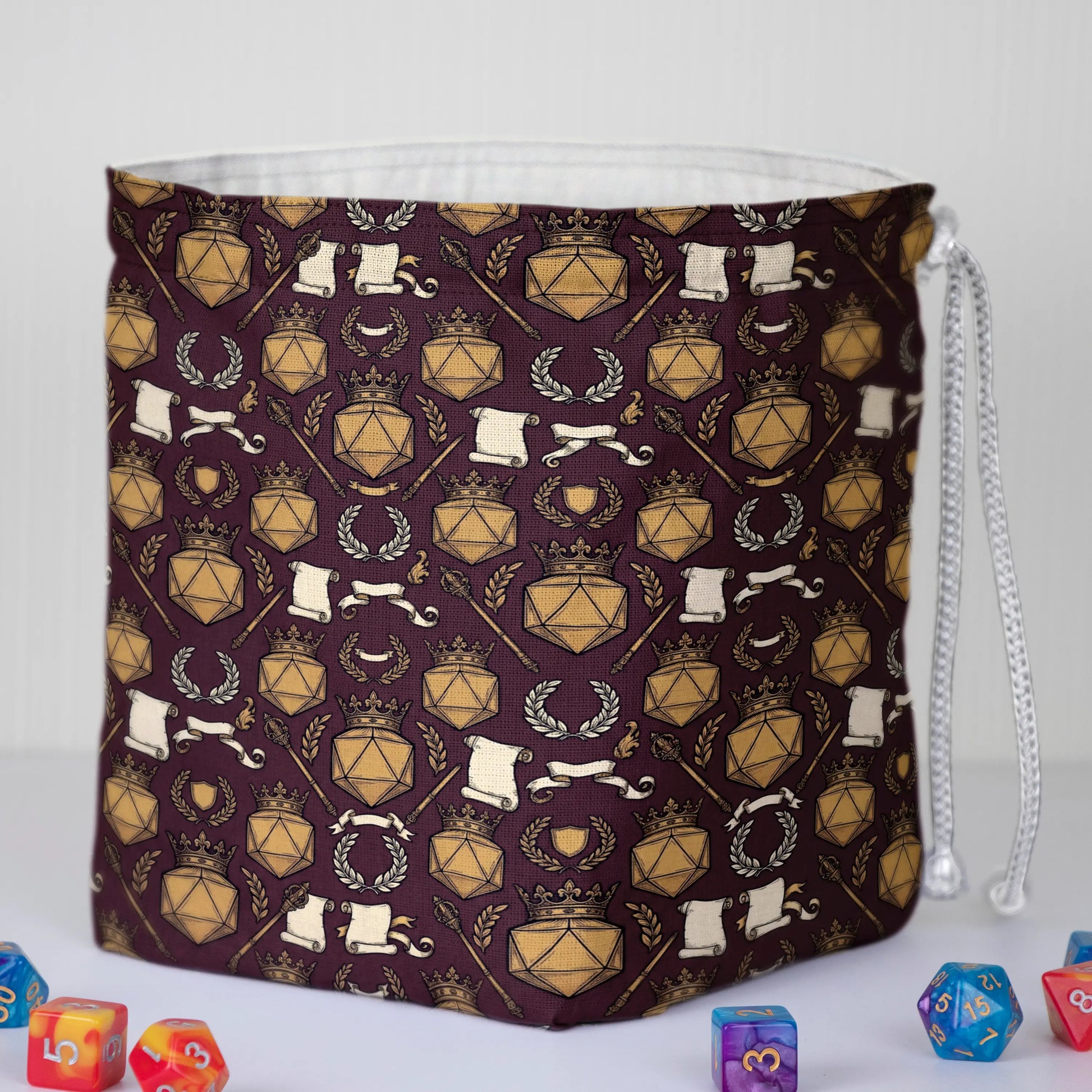 Gift for a dungeon master — crowned D20 crest dice bag with pockets on burgundy, holds 300+ dice.