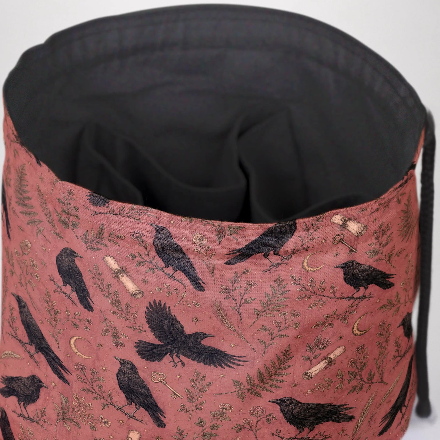 Fernwood Corvus dice bag front view with drawstring closure — cryptid dark academia DnD pouch.