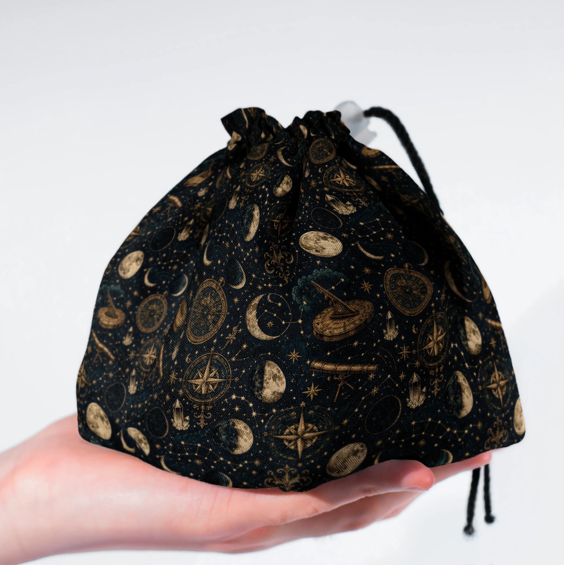 Celestial Almanac dice bag standing upright on its square base for table-side access.