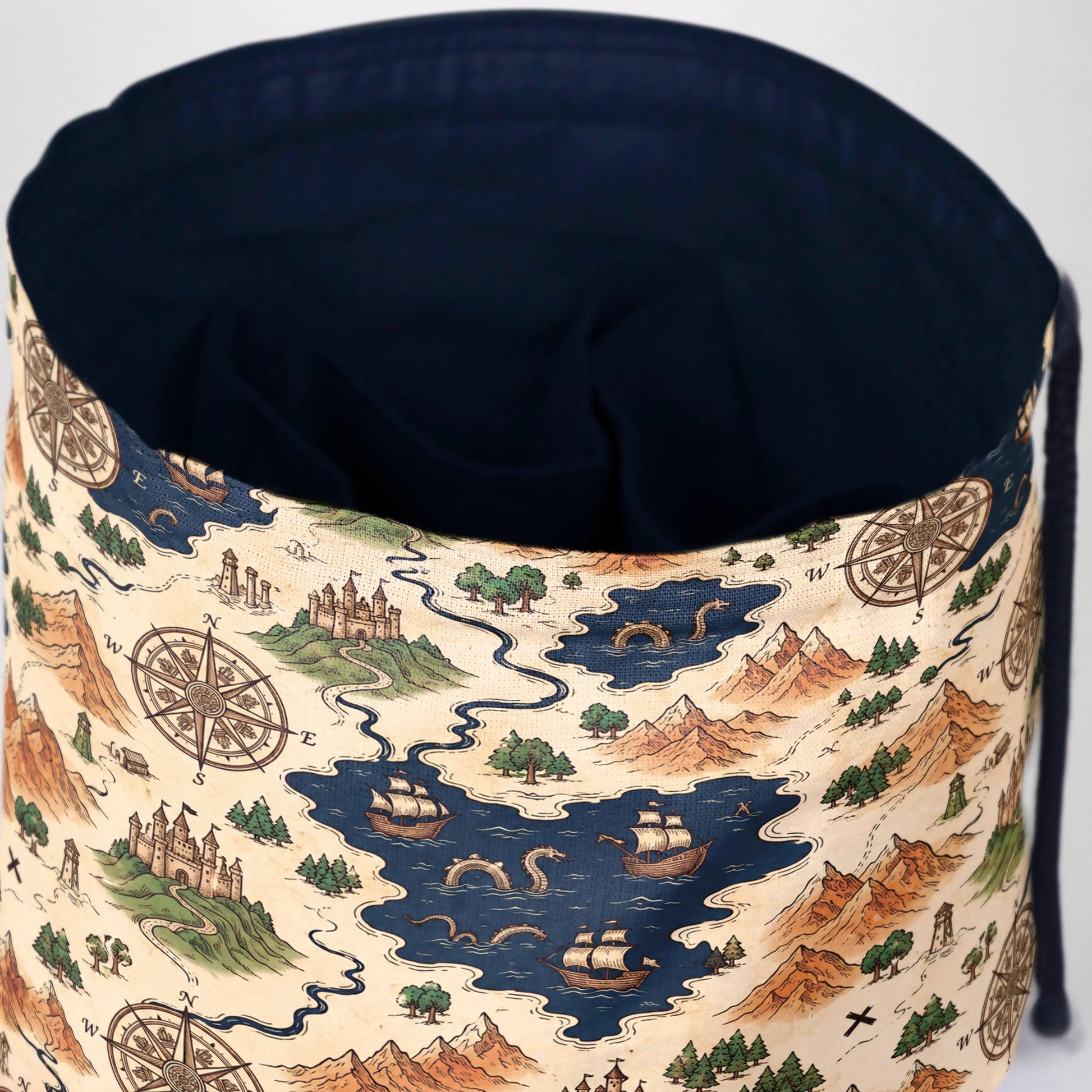 Voyager's Map dice bag standing open — large handmade dice bag with pockets.