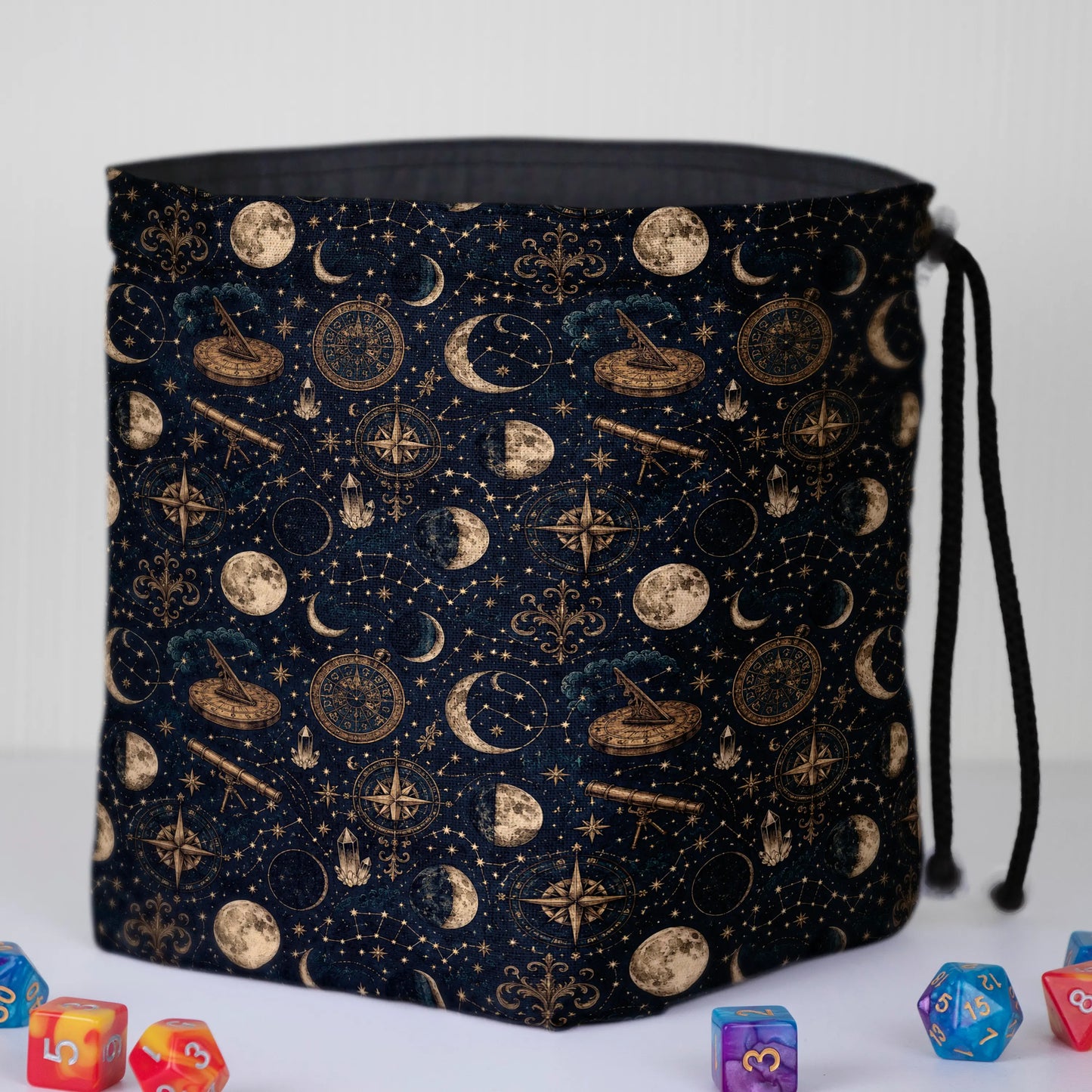Handmade celestial dice bag — zodiac wheels and constellations on navy, a 6-pocket dark academia organizer.