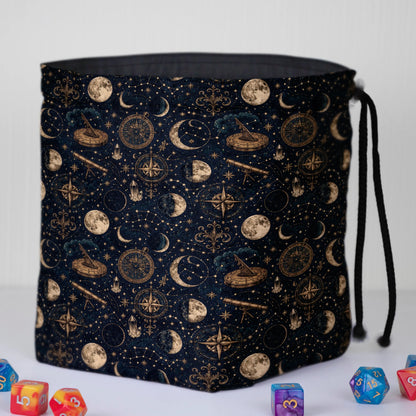 Handmade celestial dice bag — zodiac wheels and constellations on navy, a 6-pocket dark academia organizer.