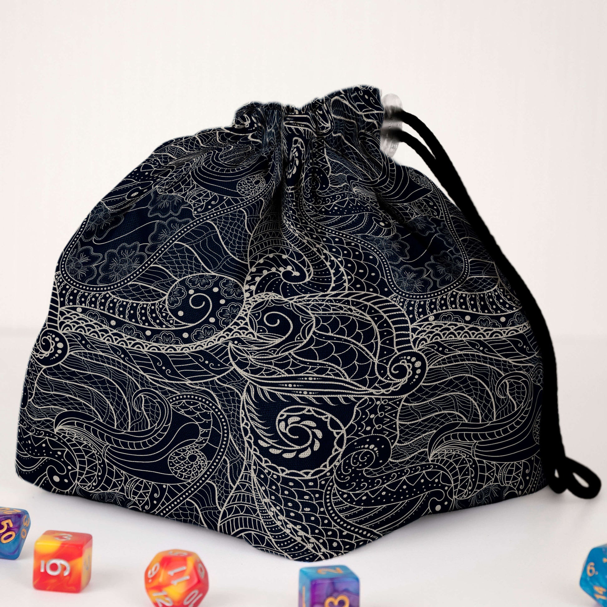 Dragon scale dice bag with rainbow pockets for sorting dice by set.