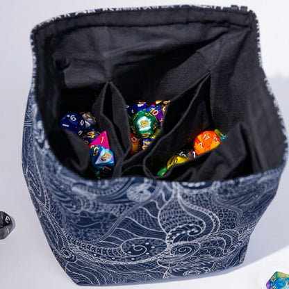 Best gift for a DnD player — dragon scale dice bag with pockets for a Dungeon Master, holds 300+ dice.