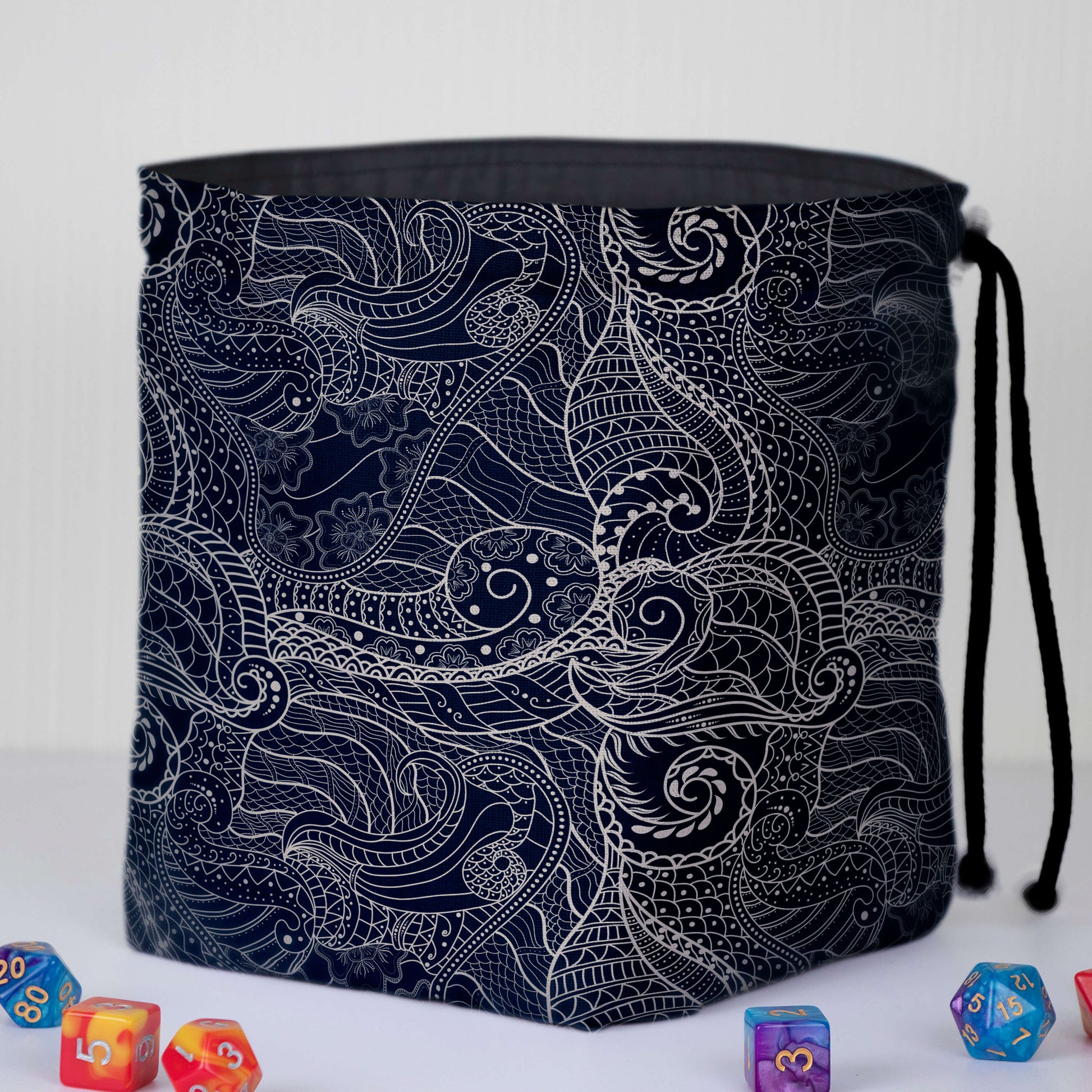 Dragon scale dice bag with 6 pockets — sorts dice sets for a Dungeon Master.