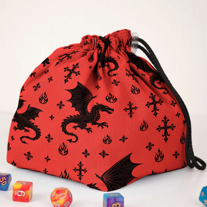 Handmade red dragon dice bag — black dragons, gothic crosses, and flames on red gabardine, holds 300+ dice.