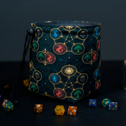 MTG dice bag with five mana element medallions linked by gold constellations on dark teal, standing open with dice