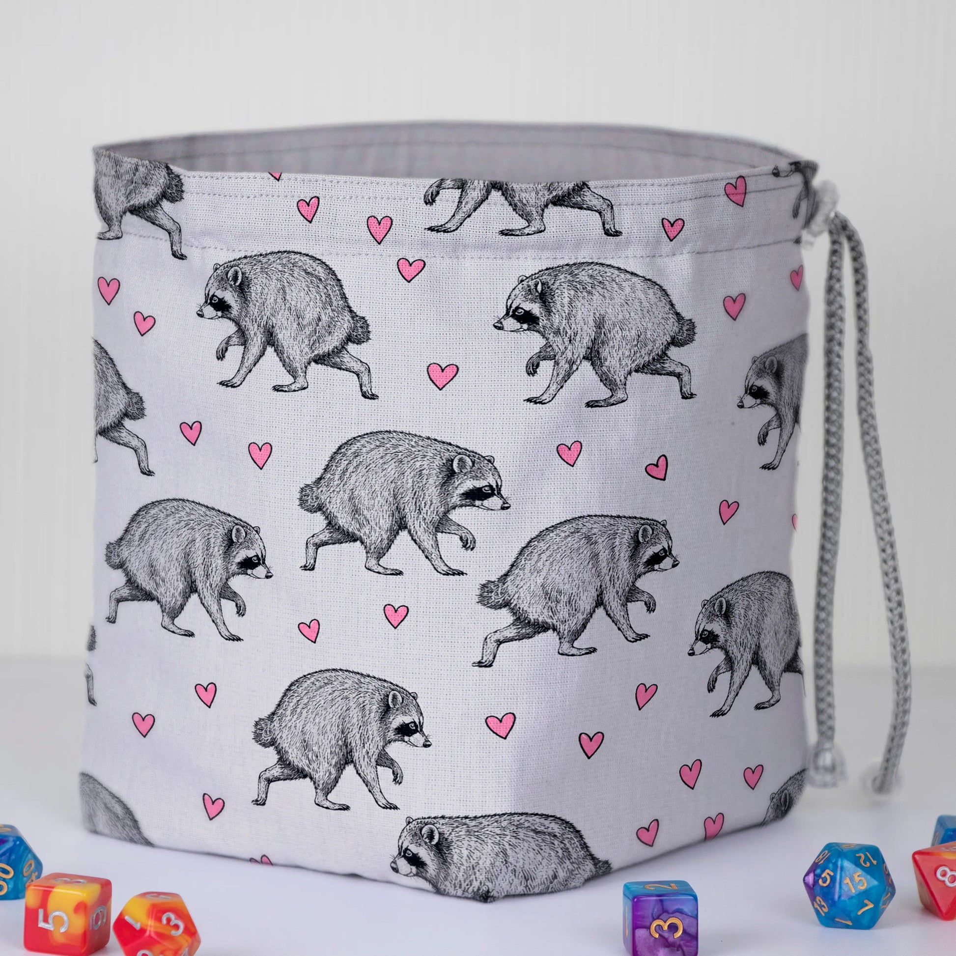 Grey Hearts Jimothy dice bag standing open on its square base with light grey lining