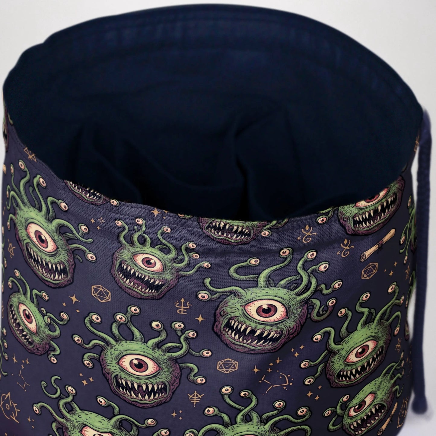 Eye tyrant dice bag — fits 6 dice sets in pockets plus loose dice in the middle