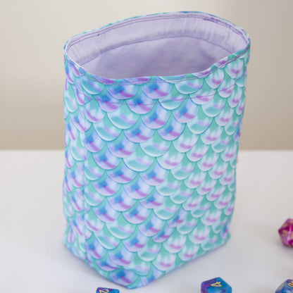 Custom dice bag open, light purple 100% cotton lining inside, mermaid scale exterior