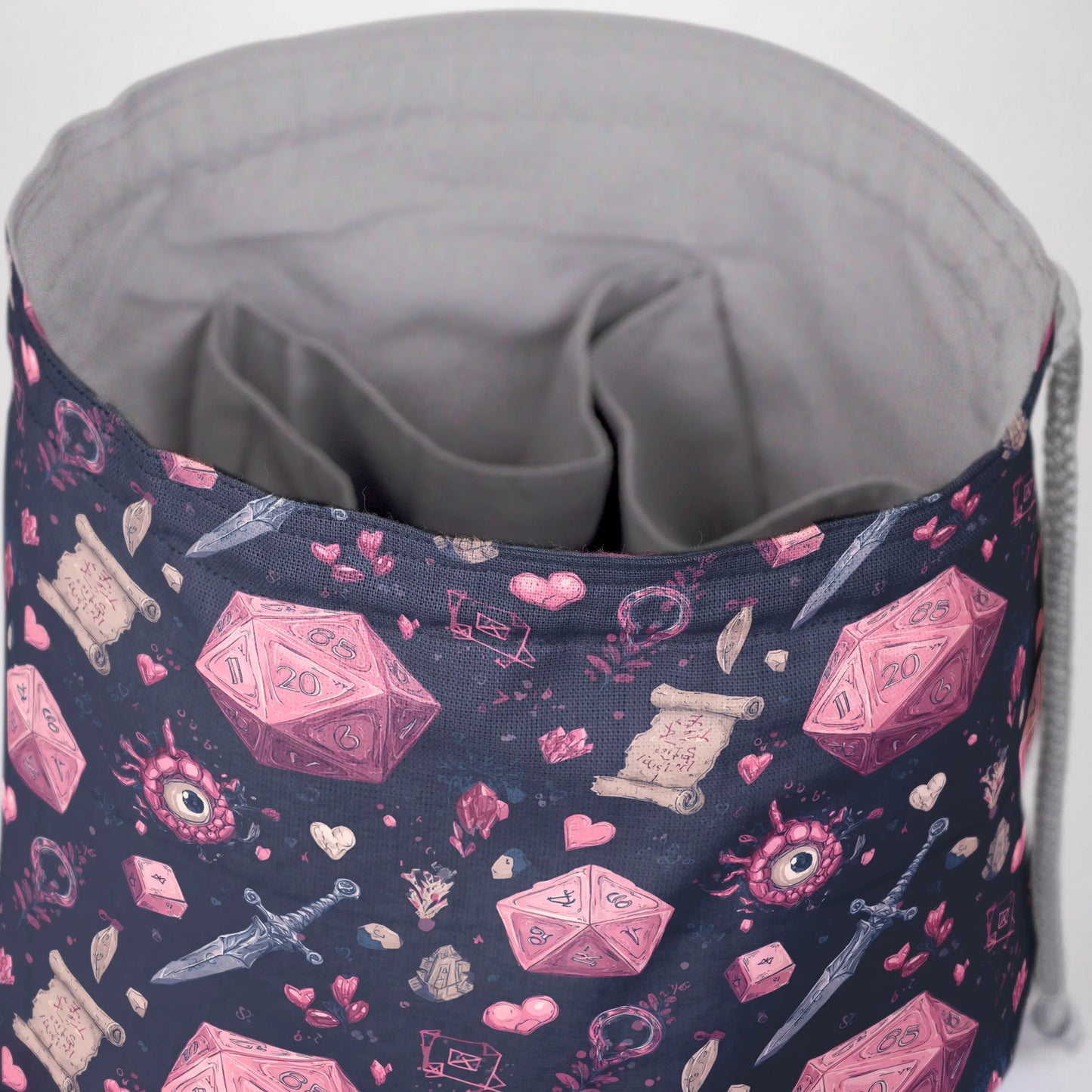 Crimson D20 dice bag standing open — large handmade dice bag with pockets.