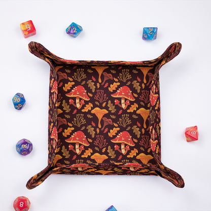 Autumn mushroom dice tray set up — soft fabric interior for quiet rolls.