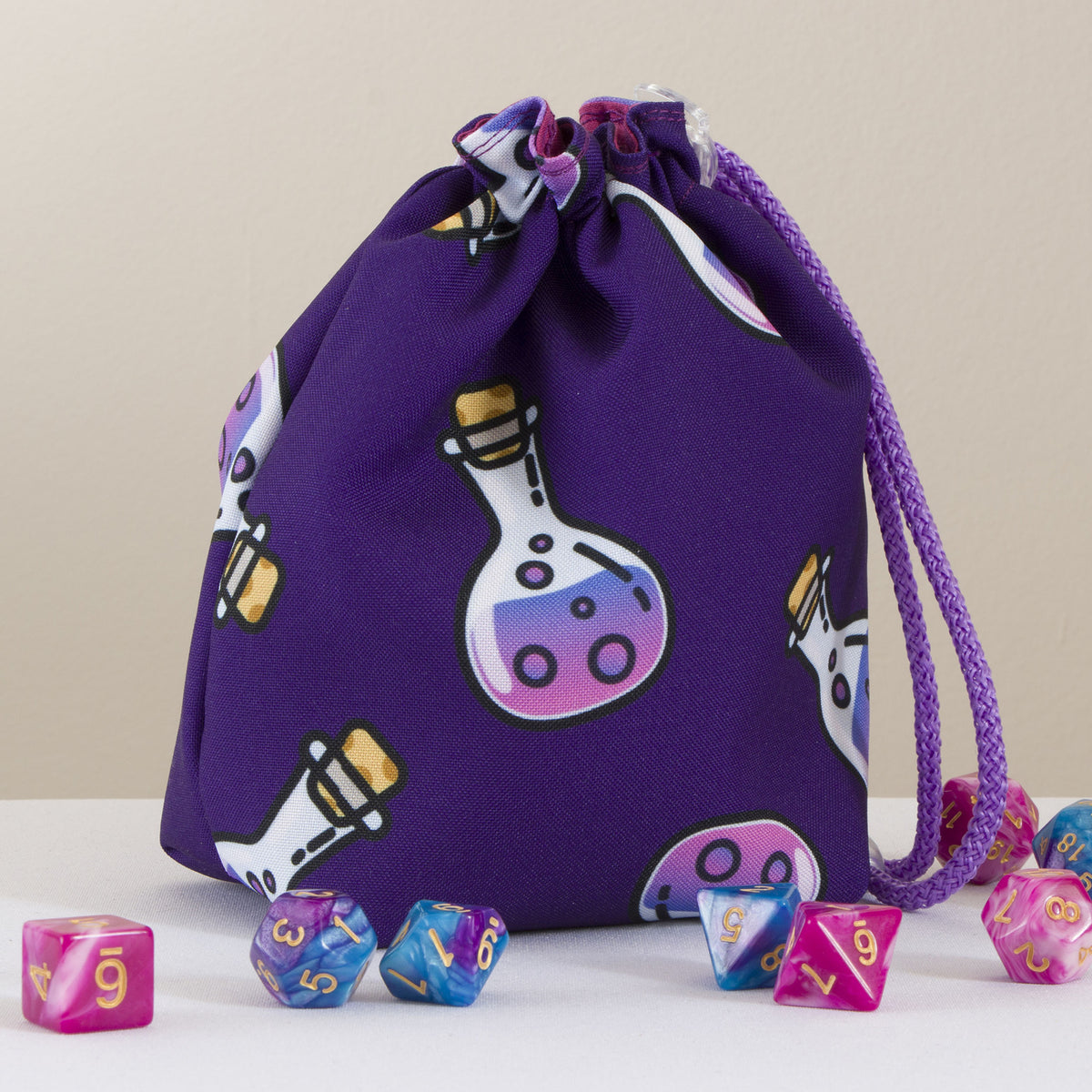 Custom printed small dice bag example: purple potion bottle pattern with drawstring, polyhedral dice around