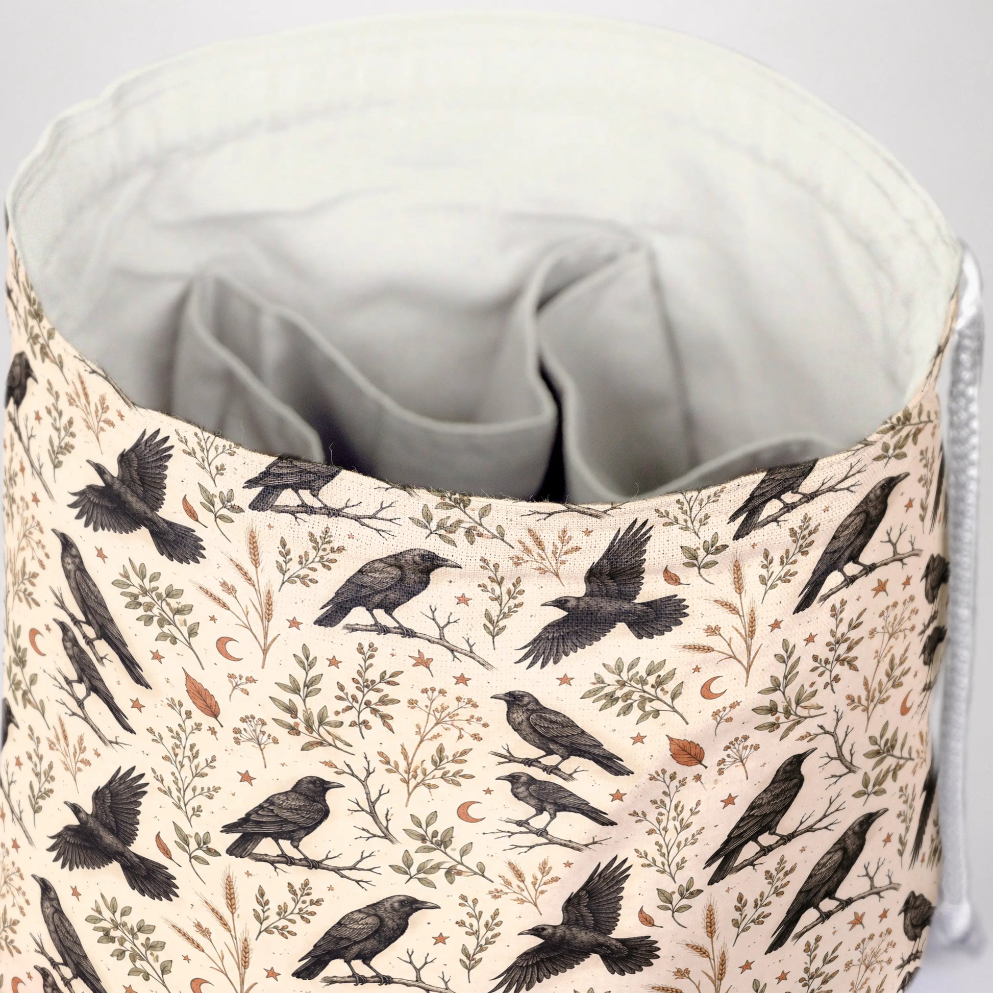A Murder of Crows dice bag front view with drawstring closure — cryptid dark academia DnD pouch.