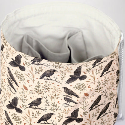 A Murder of Crows dice bag front view with drawstring closure — cryptid dark academia DnD pouch.