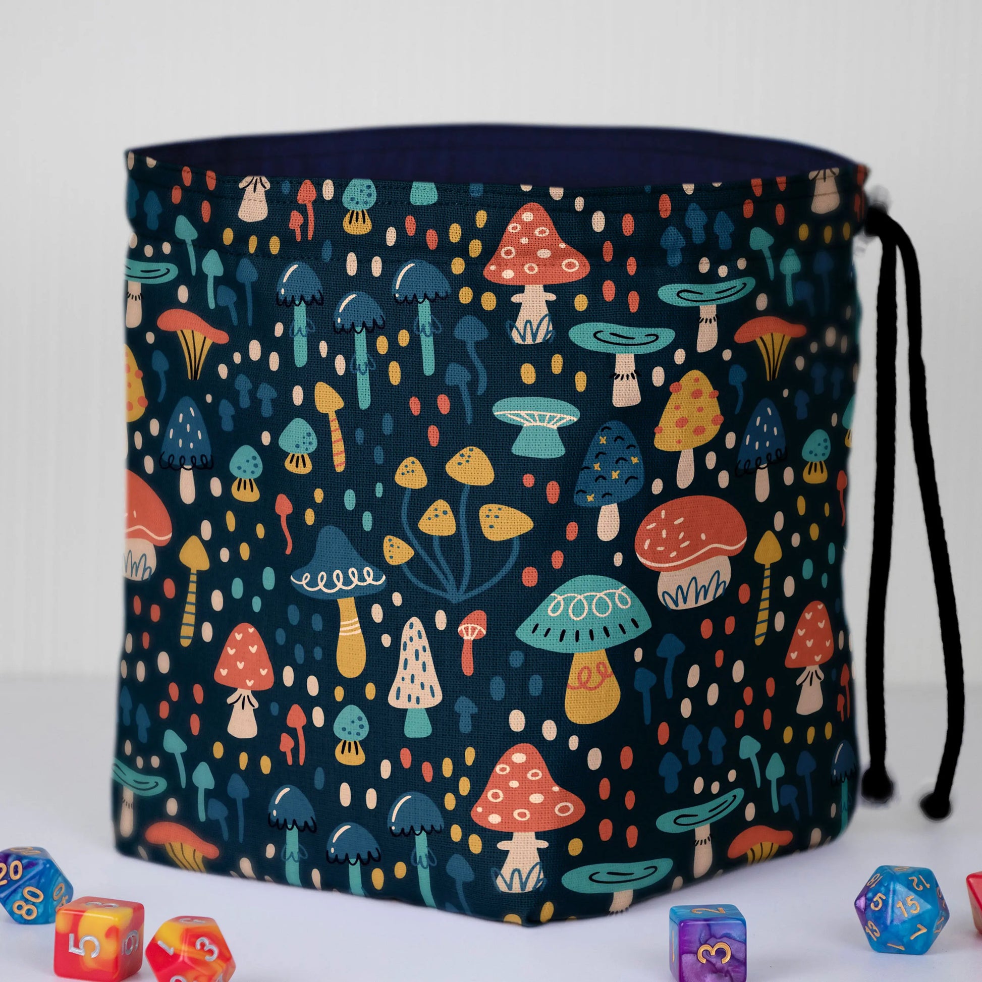 Whimsical Mushroom dice bag standing upright on its square base for table-side access.