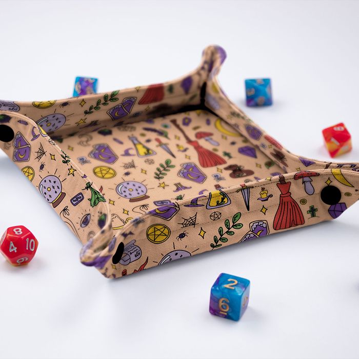 Side view of the GameFancy witchy doodle foldable dice tray with snap button corners