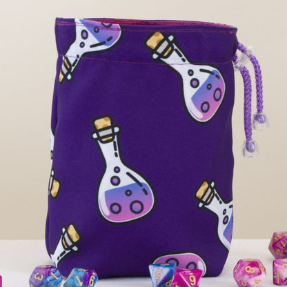 Small custom dice bag with purple potion bottles print, closed with beaded drawstring