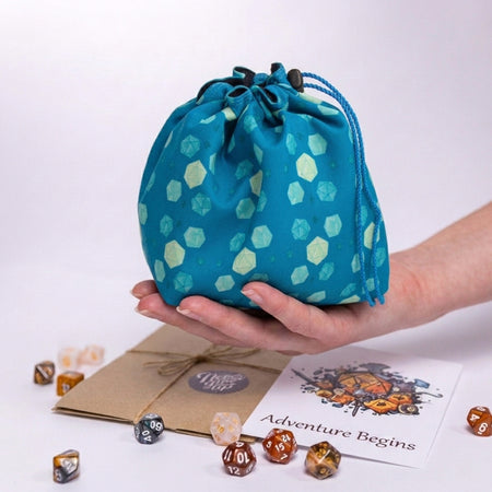 Best gift for a DnD player — teal D20 dice bag with pockets, holds 300+ dice.