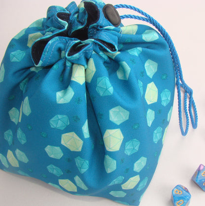 Mint dice bag standing open — large handmade DnD dice bag with pockets.