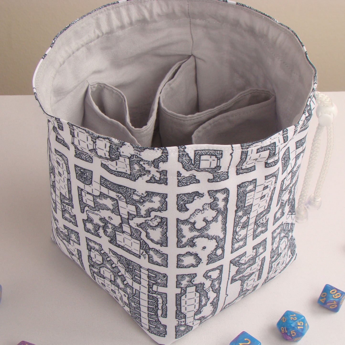 Inked dungeon map dice bag with pockets — gabardine DnD storage, handmade in Ukraine.